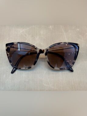 Used women’s Prada sunglasses
